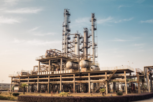 chemicals plant in a dusk sky , industrial landscape