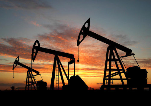 Three pumps over orange sky